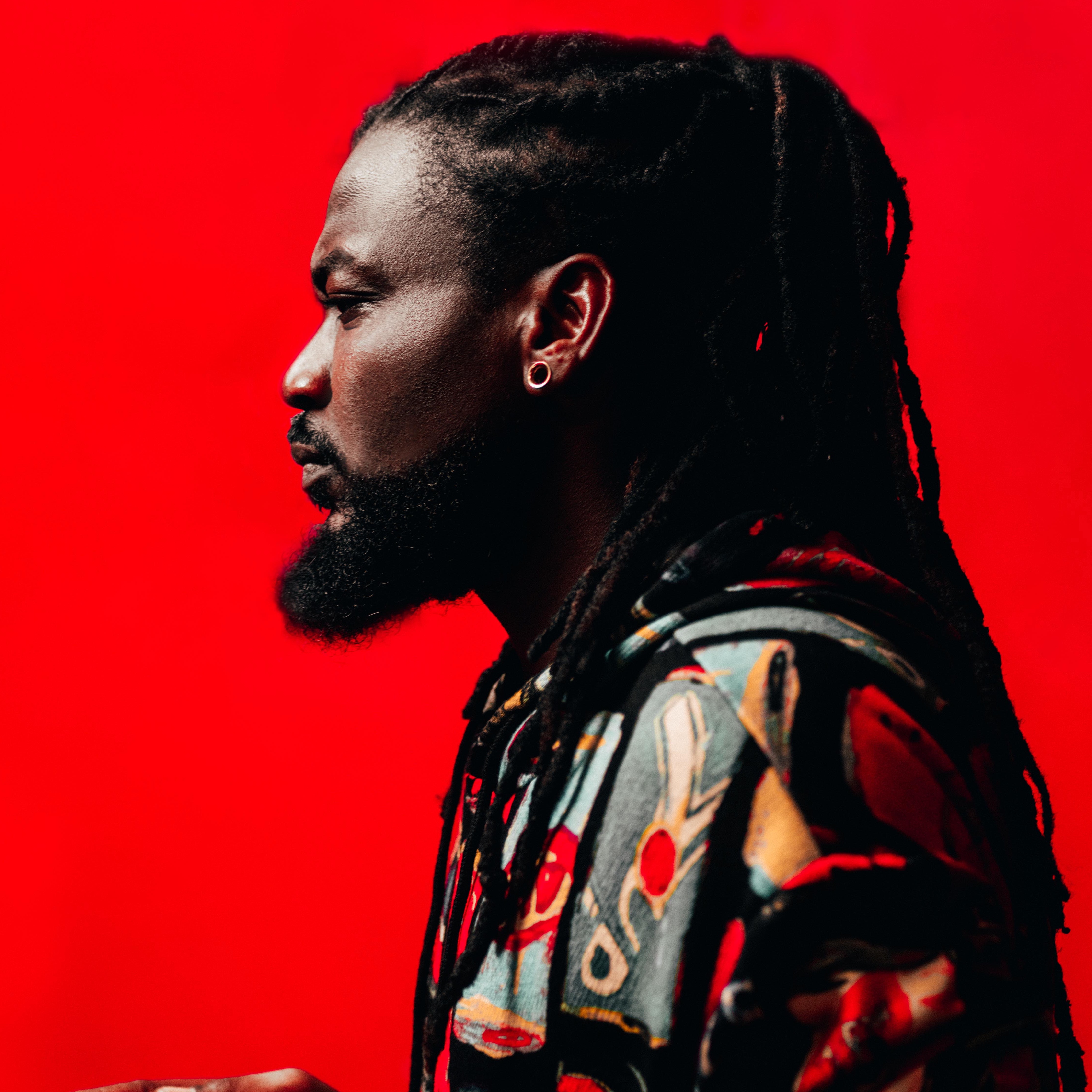 Man with long braided hairstyle