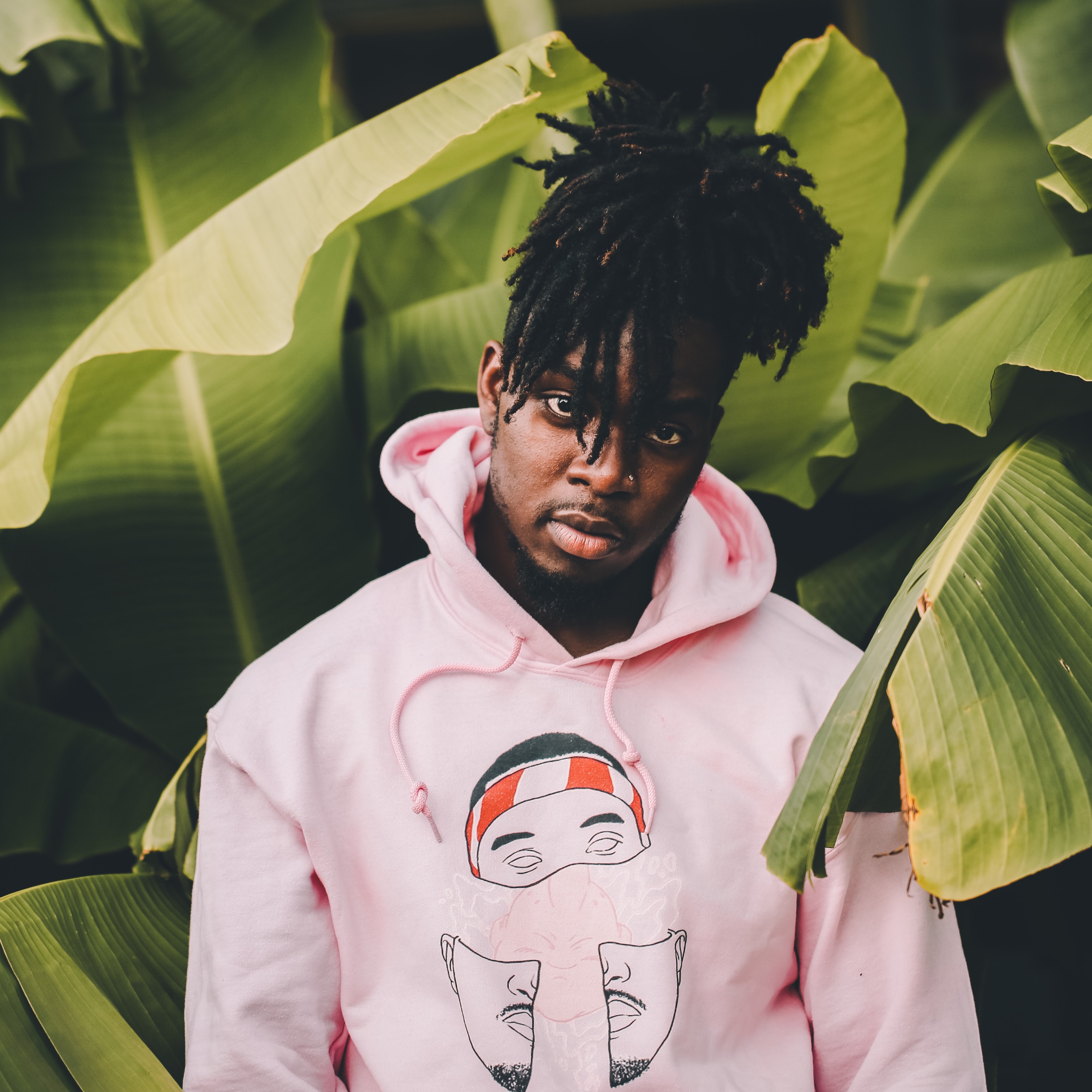 Man with short dreadlocks